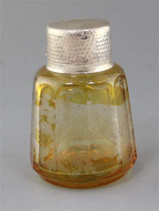 A German amber coloured spar glass perfume bottle, late 19th century, total height 15cm